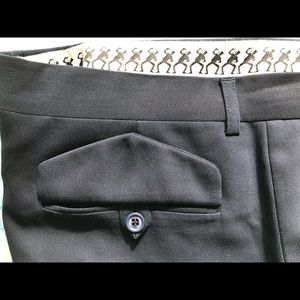 Men’s flat front trousers from Moschino